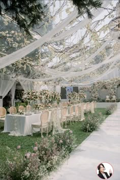 an outdoor wedding setup with tables and chairs