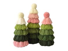 three different colored tassels with pom - poms on top of each other