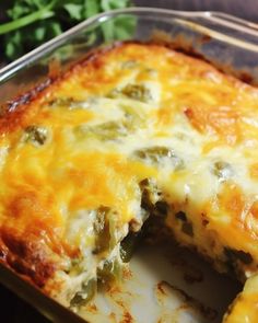 a cheesy casserole with broccoli and cheese is cut in half