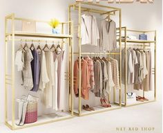 an image of a clothing rack with clothes