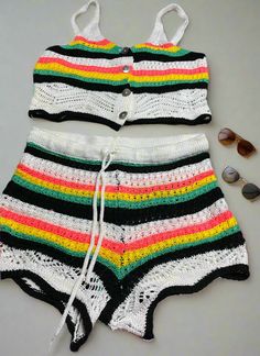 Dance the night away in this sizzlin' Miami Nights Crochet Short Set! This flirty two-piece set features a crop top with spaghetti straps and buttons, plus a pair of shorts with a drawstring for the perfect fit. The multicolored colorblock and horizontal strip designs will have you looking stylish in every shot. Perfect for vacations, trips, cruises, boat and yacht parties, pool parties, day dates, and more! Accessorize with a beach hat, sunglasses, tote bags, jewelry, and more! Fits true to siz Crochet Pjs Set, Crochet Pjs, Crochet Short Set, Yacht Parties, Miami Nights, Miami Night, Pjs Set, Yacht Party, Spaghetti Strap Crop Top