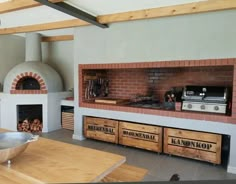 a kitchen with an oven, counter top and wooden crates in front of the stove