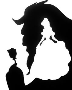 the silhouette of a man and woman are facing each other in front of a white background