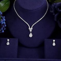 The Maria Jewelry Set Is A Pretty Bridal Jewelry Set With A Crystal Water Drop Extender And Matching Earring. Necklace Length: 18 Inches (42 Cm + 3 Cm Extender) Earring Length: 0.8 Inches (2 Cm) Available In Silver, Other Colors Deliver In A Week. #Bridaljewelry #Bridalearrings, #Czearrings #Silverjewelry #Earrings Wedding Jewelry For Bride, Bridal Necklace Set, Silver Wedding Jewelry, Diamond Jewelry Necklace, Diamond Jewelry Designs, Bridesmaid Jewelry Sets, Bride Jewellery, Wedding Jewelry Sets, Bridal Jewelry Sets