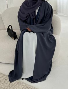 This navy and grey double sided abaya is uniquely designed to be worn either side, giving you two abayas in one. This abaya is perfect for both special occasions or everyday wear, can be dressed up with heels for the night and casual shoes for the day. Product details: Hijab: Soft chiffon. colour: Navy Care instructions: - Delicate wash/Hand wash. - Iron on low heat. Slip dress NOT included. Kindly be advised that the color of the abaya may vary slightly from what is displayed on your screen due Navy Abaya, Easy Trendy Outfits, Trendy Outfits, Special Occasion