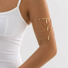 Description:Geometric Layered Metal Bar Chain Tassel Arm Cuff Specification:Size: 5.9" * 3.5"Weight: 0.36 oz/pcsMaterial: Alloy MetalColor: Gold/Silver Features & Details:This chic layered gold silver tone chain tassel arm band is made of high quality alloy metal. It is well polished and never fade, rust, tarnish, corrode, stain, never turn skin green, hypoallergenic and nickel free, 100% healthy for body and environment.The sparkling beveled edge gives off a chic and modern charisma and will be Upper Arm Bracelet, Arm Bangles, قلادات متدلية, Arm Bracelets Upper, Arm Bracelet, Hand Cuff Bracelet, Arm Jewelry, Arm Bracelets, Body Chains