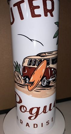 there is a coffee cup with an image of a camper on it and the words dogue paradise