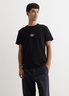 Stone Island's heritage-inspired streetwear designs are armed with a distinct sports aesthetic. Look out for technical jackets, cosy sweats and easy-to-wear T-shirts in the latest collection. The Archivo Short Sleeve T-Shirt is an elevated basic, with a comfortable cut, small logo on the chest and printed back. Wear over the Ghost Cargo Shorts and XT-6 Sneakers for a refined, casual look. - Soft cotton jersey- Crew neckline- Short sleeves- Printed front and back Materials: 100% Cotton.  Care: Cold machine wash. Sizing: Item fits true to size. Model wears a size M and is 185cm/6'1". Streetwear Designs, Sports Aesthetic, Aesthetic Look, The Ghost, Stone Island, Cargo Shorts, Crew Neckline, Casual Looks