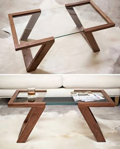 a glass coffee table with wooden legs and an upside down shelf in the middle, sitting on top of a white furnishing