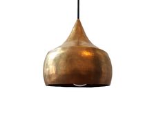 a gold colored pendant light hanging from a ceiling