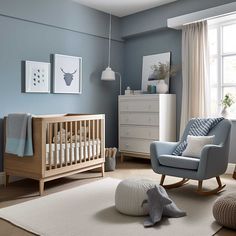 a baby's room with blue walls and furniture