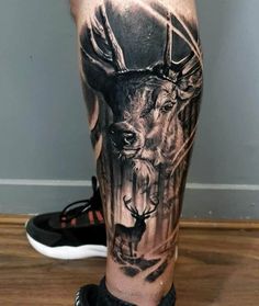 a man with a deer tattoo on his leg