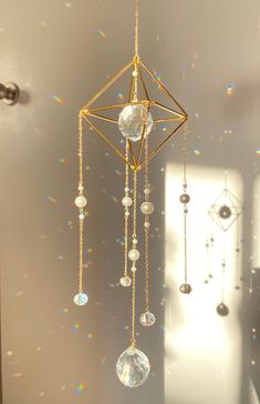 a wind chime hanging from the ceiling in a room