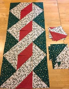 the quilts are laid out on the floor to be sewn together and put together