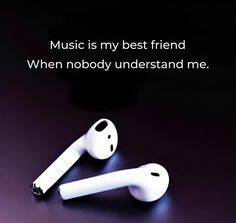 two white earbuds sitting on top of a table next to each other with the caption music is my best friend when nobody understand me