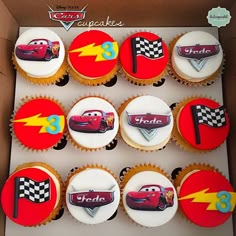 the cupcakes are decorated with cars