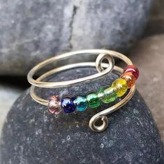 Product Details: Ring Size: One Size Design: Beaded Color: Rainbow Quantity: 1 Piece Occasion: Daily Material: Stainless Steel Wire Jewelry Rings, Sterling Silver Thumb Rings, Bijoux Fil Aluminium, Fidget Rings, Diy Wire Jewelry, Wire Work Jewelry, Work Jewelry, Wire Rings, Stainless Steel Ring