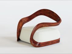 a chair made out of wood and white fabric with curved backrests on the seat