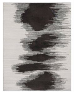 an abstract rug with black and white colors