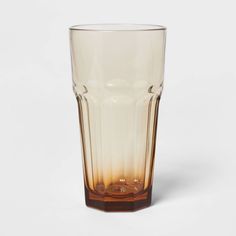 a tall glass sitting on top of a white table