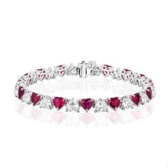 For Sale on 1stDibs - Gorgeous and Unique Ruby and Diamond Bracelet. 16 Heart Shaped Rubies weighing 10.20 Carats. 16 Heart Shaped Diamonds weighing 8.15 Carats. Set in Platinum. Luxury Diamond Heart Bracelet For Anniversary, Diamond Accented Bracelets For Valentine's Day Wedding, Wedding Bracelets With Diamond Accents For Valentine's Day, Anniversary Tennis Bracelet For Valentine's Day, Valentine's Day Anniversary Tennis Bracelet, Luxury White Gold Heart Bracelet For Wedding, Formal Heart-shaped Diamond Accented Bracelet, Formal Heart Cut Bracelet With Diamond Accents, Formal Heart Bracelet With Diamond Accents