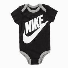 Introduce your little one to the iconic style of Nike with the Kid's Futura Bodysuit 3-Piece Box Outfit. Made with soft and comfortable material, this outfit features a bodysuit, hat, and booties, perfect for keeping your baby cozy and stylish. The classic Nike logo adds a touch of athletic flair to this versatile set. More Details Color: Black Style: MN0073-023 Nike Baby Clothes, Cazal Eyewear, Jordan Shop, Billionaire Boys Club, Nike Kids, The Black Keys, Viktor & Rolf, G Star Raw, Jean Shirts