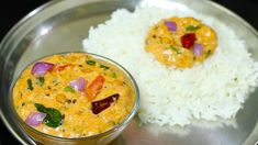 a plate with rice and some food on it