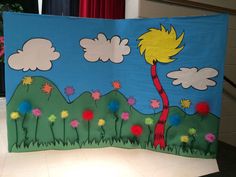 a child's art project with the dr seuss tree and flowers on it