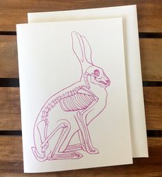 a card with a drawing of a rabbit on it