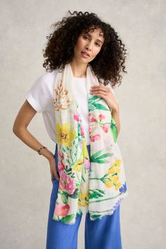 Embrace the spirit of spring with our lightweight Spring Garden Cotton Scarf. This whimsical and colourful design featuring flowers and insects looks fabulous when paired with one of our essential t-shirts and our signature Bengajean® bien sûr! Crafted from a cotton, modal and linen blend. Colourful Design, Garden Print, Cotton Scarf, Wearing Clothes, Spring Garden, Sustainable Clothing, Winter Wear, The Spirit, Body Measurements