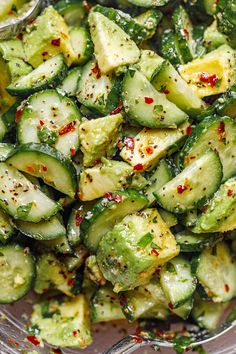 cucumber and pepper salad in a clear bowl