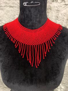 All our pieces are genuine and each necklace is handcrafted by artisans from the most representative areas of huichol art.We only have one piece of each style, choose the choice or style you like and only choose 1 amount of each style you want, thank you. Artisan Beaded Chain Necklace, Handmade Red Beaded Choker Necklace, Gift Red Handwoven Beaded Necklaces, Artisan Style Beaded Chain Necklace, Red Handwoven Necklaces With Round Beads, Handmade Red Bib Necklace With Round Beads, Unique Bib Necklace With Colorful Beads As Gift, Unique Bib Necklace With Colorful Beads For Gifts, Artisan Necklace With Dangling Beads For Gift