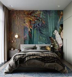 a bedroom with a large bed and wall mural