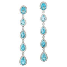 These earrings are handcrafted in 18K gold, 9.93 carats Apatite and 1.52 carats of sparkling diamonds. FOLLOW MEGHNA JEWELS storefront to view the latest collection & exclusive pieces. Meghna Jewels is proudly rated as a Top Seller on 1stDibs with 5 star customer reviews. All items manufactured by us are handmade and can be customized or redesigned. Composition Size-68X9 MM Total Weight-12.139 Gold Weight(Gms)-9.848 Diamond Wt(Cts)-1.52 Apatite Wt(Cts)-9.93 Teal Jewelry, Apatite Jewelry, Vintage Drop Earrings, Sparkle Jewelry, Gold Diamond Earrings, Blue Apatite, Diamond Gold, Blue Zircon, Lovely Jewellery