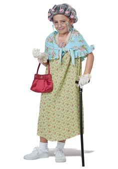 an old woman in a dress holding a cane and a handbag, posing for the camera