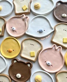 several decorated cookies are arranged in the shape of bears