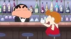 a woman sitting at a bar next to a man in a tuxedo