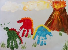 children's drawing of three dinosaurs in front of a volcano