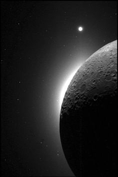 an image of the sun and moon taken from space