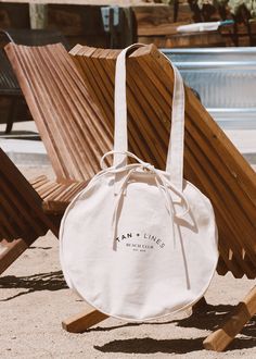 BEACH CLUB TOTE BAG - TAN + LINES by Sivan Ayla Cheap White Canvas Beach Bag, Cheap White Reusable Beach Bag, Cheap Neutral Beach Bags, Luxury Eco-friendly Tote Beach Bag, Luxury Eco-friendly Everyday Beach Bag, Cheap White Beach Bag For Day Out, Luxury Beach Bucket Tote Bag, Cheap Eco-friendly Bags For Beach Season, Cheap Eco-friendly Beach Bag For Summer