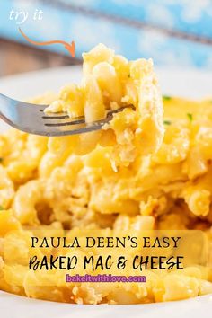 a fork full of macaroni and cheese on a plate with text overlay that reads, paula deen's easy baked mac & cheese