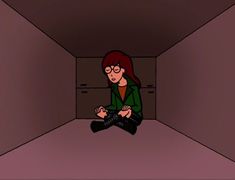 a woman sitting on the floor in an empty room