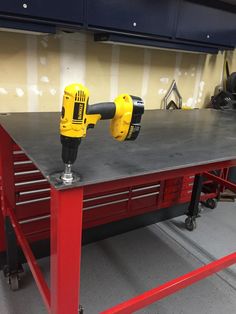 a workbench with two drillers on it