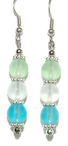 the earrings are made with glass beads and silver findings on each earring, which have been