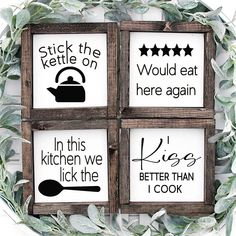 four kitchen signs with sayings on them in the shape of wooden frames, surrounded by greenery