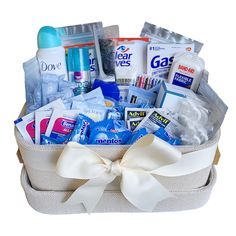 a white basket filled with lots of hygiene products