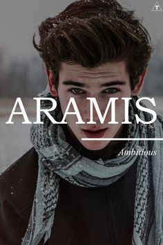 a man wearing a scarf and jacket with the words aramis on it in front of him