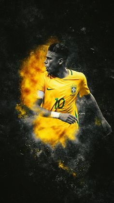 the soccer player is wearing yellow and black