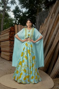 Printed Lehenga Blouse with Embroidery Chinnon Silk Cape Jacket Three Piece Wedding Party Wear Dress Indo Western Outfits Crop Top Skirt Set Item - LEHENGA , BLOUSE ,CAPE Fabric - Chinnon Silk and Georgette Satin Color - Aquamarine Lehenga Length - 44 Cape Length - 50 Blouse Length - 15 Size - (XS), (S), (M), (L), (XL), (2XL) Size chart attached in images mentions garment measurements in inches. For any sizing queries or getting a customized fit, please message us on Etsy. WASH & CARE Gentle han Silk Dresses With Zari Work Long Skirt, Traditional Set With Long Skirt And Floral Embroidery, Front Open Lehenga With Resham Embroidery For Reception, Embroidered Sets With Cape Sleeves For Reception, Traditional Sets With Floral Embroidery And Long Skirt, Traditional Floral Embroidered Long Skirt Set, Traditional Dresses With Floral Embroidery And Cape Sleeves, Traditional Set With Floral Embroidery And Long Skirt, Traditional Front Open Georgette Lehenga