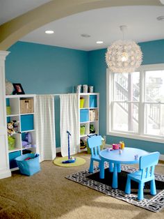 the room is clean and ready to be used as a child's playroom